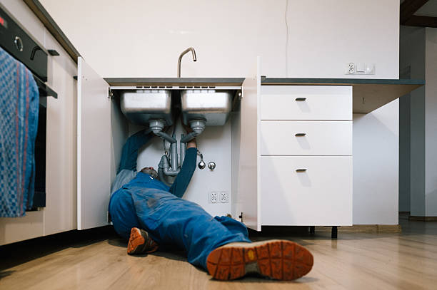 Professional Plumbing technician working in Wheatcroft, KY